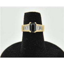 18RPS-16 SAPPHIRE RINGOne ladies ring in 14k yellow gold set with  an emerald cut sapphire approx.2c