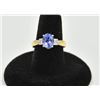 Image 1 : 18PRS-14 TANZANITE & DIAMOND RINGOne ladies ring in 18k yellow gold set with a  oval tanzanite wt ap