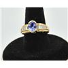 Image 1 : 18PRS-17 TANZANITE & DIAMOND RINGOne ladies ring in 14k yellow gold set with a  oval tanzanite appro