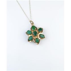 185CAI-58 EMERALD PENDANTColorful flower design Emerald pendant with  approx. 4.00 carats in stones 