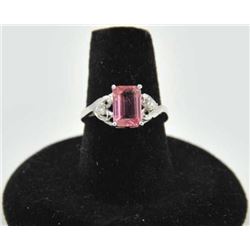 18PRS-11 TOURMALINE & DIAMOND RINGOne emerald cut pink tourmaline  approx 2ct  with 2 side diamonds 