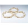 18CAI-62 BANGLE BRACELETNice lot of three Freshwater Pearl bangle  bracelets of a peach cream color 