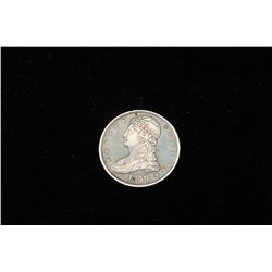 17HD-107 1838 HALF DOLLAR1838 Half Dollar XF-A.U. Toned dark blue. Not  professionally graded. Est.: