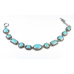 18CAI-74 TURQUOISE BRACELETNice bracelet bezel set with Turquoise in  Sterling silver. Estimates $20