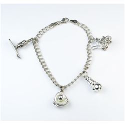 185CAI-69 CHARM BRACELETNice Vintage Italian charm bracelet featuring  baseball surfer stroller and 