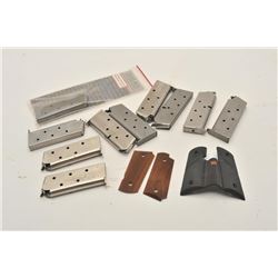 18BM-74 DETONIC CLIPS11 Detonics magazines with a couple of  manuels and 2 pairs of grips. Est.: $20