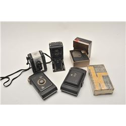 18AL-83 VINTAGE AND ANTIQUE CAMERA LOTBonanza lot of vintage and antique box  cameras, Polaroid, Bro