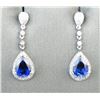 Image 2 : 18CAI-30 SAPPHIRE & DIAMOND EARRINGSElegant dangle earrings featuring two pear  shape lab created Sa