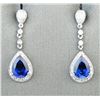 Image 3 : 18CAI-30 SAPPHIRE & DIAMOND EARRINGSElegant dangle earrings featuring two pear  shape lab created Sa
