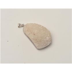 17LP-18 GEODE PENDANTGeode pendant with silver tone case.  The 2”  x 1 ¼” pendant is set with a silv
