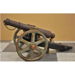 17JL-136 BLACK POWDER CANNONLot of collectibles including an iron signal  cannon on iron carriage wi