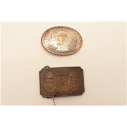 18AG-5 STERLING ENGRAVED BUCKLELot of two ornate metal belt buckles.  The  first is an engraved ster