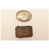 18AG-5 STERLING ENGRAVED BUCKLELot of two ornate metal belt buckles.  The  first is an engraved ster