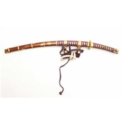 17ASB-257 MODERN BOYS SWORDJapanese Boy’s sword with scabbard.  This  modern reproduction is 20” in 