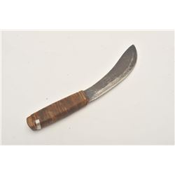 18AP-55 TRADE KNIFEUn-marked Indian-type skinning knife with  wood grip; approximately 11” overall w