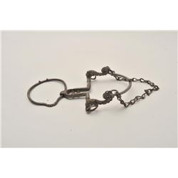 18AP-88 RING BITAntique iron ring bit.  The lot includes one  antique iron ring bit marked, “ACA TEC