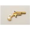 Image 2 : 18BT-4 COLT 22 DERRINGERColt .22 derringer with gold finish and pearl  grips. NSNV. Lock broken. 80%