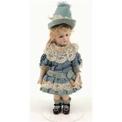 A Bru Jeune bisque doll, moulded numeral 1 to back of head, with blonde wig, fixed glass eyes and...