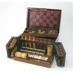 A mid 19th century rosewood games compendium, with swing doors and compartmented interior housing...