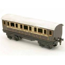 A Marklin gauge I First Class bogie coach, lithographed in L&NWR brown and cream livery, No.2873,...