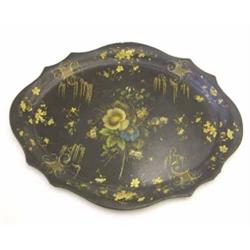 A large Victorian lacquered papier mache oval tray, decorated with a central floral spray amidst...