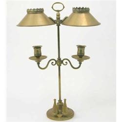 A late 19th century Miller & Son brass twin light students lamp, with adjustable mechanism and tw...