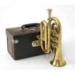 An all brass cornet by Bessons & Co, number H75983, cased, 10.75ins with mouth piece...