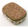 Image 1 : A gilt metal and granite mounted trinket box, decorated with a foliate polychrome enamel band, 2....