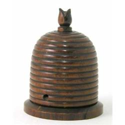 A Victorian lignum vitae string box, in the form of a beehive with foliate finial, 3.5 ins...