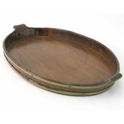 A Georgian brass bound mahogany tray, of oval form with twin handles, 23 ins...
