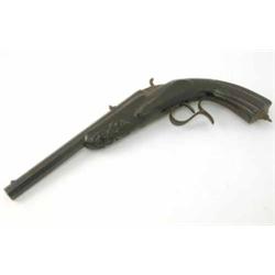A 19th century pistol, the sighted octagonal barrel with proof marks, foliate carved full wood st...