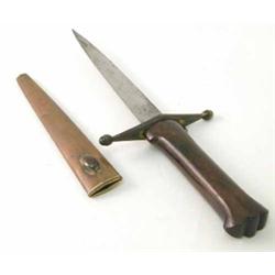 A Continental dagger, with 5.75 inch double edged blade, engraved brass guard and burr wood handl...