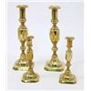 Image 1 : Two pairs of 'King of Diamonds' style brass candlesticks, with knopped stems and canted square ba...