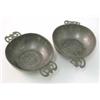 Image 1 : A pair of pewter porringers, each bowl decorated with a stylised rose and pierced handles, touch...