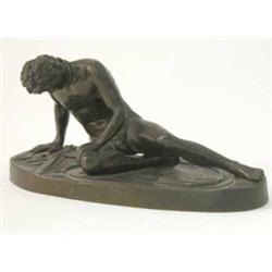 A bronze figure of the Dying Gaul, impressed foundry mark for F. Barbedienne, 7.25 ins...