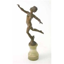 An Art Deco bronze figure of a naked female dancer, signed Strobl, modelled standing on one leg w...