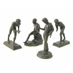Four bronze figures of Greek athletes, each modelled in various poses, unmarked, 5 ins tallest...