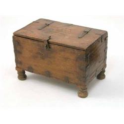 A 19th century Scandinavian miniature beech chest, with hinged lid and decorated throughout with...