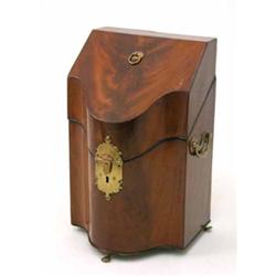 A George III serpentine fronted mahogany knife box, with fitted brass lock plate and handles on c...