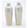 Image 1 : A pair of Ruskin vases, slender tapering form with collar rim, pale pink and yellow iridescent gl...