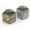 Image 1 : Two small Troika square shaped vases, one decorated with textured blue glazed sides, the other in...