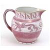 Image 1 : A pink lustreware jug, decorated with bands of stylised dragons and geometric patterns, 6ins...