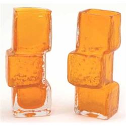 A pair of Whitefriars drunken bricklayer vases, designed by Geoffrey Baxter in textured tangerine...