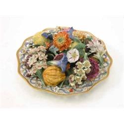 A Meissen floral centrepiece, with a naturalistic and finely modelled still life of fruit and flo...