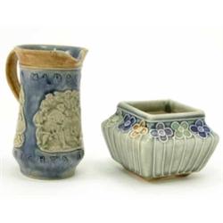 A Royal Doulton glazed stoneware jug, relief-moulded with scenes from 'A Mid-Summer Nights Dream'...