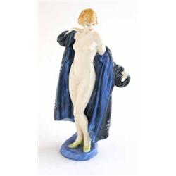 A Royal Doulton figure, The Bather, HN687 in production 1924-49, girl draped in blue robe, 8ins...