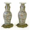 Image 1 : A pair of 19th century Cantonese baluster vases, applied with salamanders and profusely decorated...