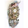 Image 1 : A large Meissen wall clock, circa 1860-80, the circular drum dial set into a tall shell and scrol...
