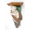 Image 1 : A Minton majolica wall bracket, with shaped oak shelf, the support in the form of a merboy clutch...