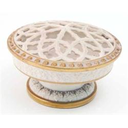 A Grainger & Co. Worcester pot pourri, of squat circular shape, the pierced cover with gilded rim...